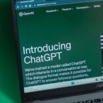 a laptop computer with the word chatgpt on it